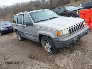 1995 Jeep Grand Cherokee Laredo with VIN 1J4GZ58S4SC532578, listed as a IAAI auction lot 41936041 with 161,777 mi miles. Bid and sale history available at carsss.com. Image 1.