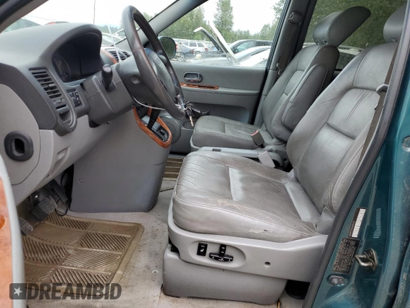 2004 Kia Sedona LX with VIN KNDUP131446581402, listed as a Copart auction lot 68083144 with 171,868 mi miles and Clean Title. Bid and sale history available at carsss.com. Image 7.