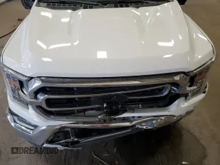 2021 Ford F-150 XL with VIN 1FTFW1E88MKE41611, listed as a Copart auction lot 61092115 with 83,277 mi miles and Salvage title. Bid and sale history available at DreamBid. Image 11.