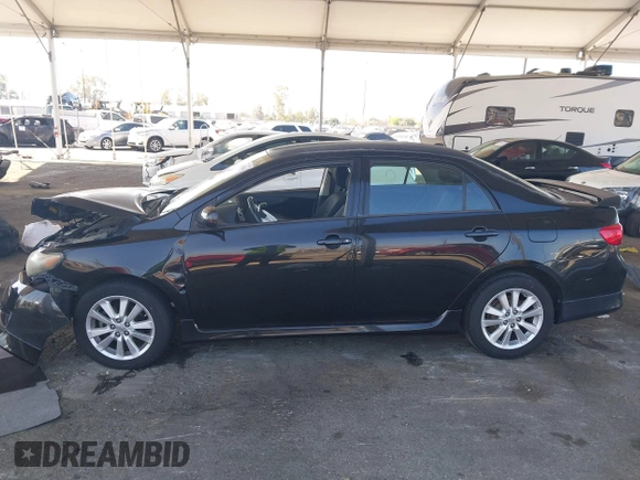 2010 Toyota Corolla with VIN 2T1BU4EE3AC419928, listed as a IAAI auction lot 41976564 with 143,075 mi miles. Bid and sale history available at carsss.com. Image 14.