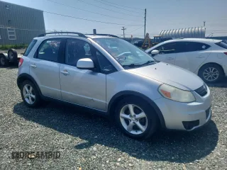 2009 Suzuki SX4 Man AWD with VIN JS2YB413196204559, listed as a Copart auction lot 61994234 with 180,757 mi miles and Salvage Title. Bid and sale history available at carsss.com. Image 4.