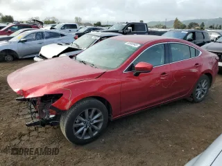 2018 Mazda Mazda6 Sport with VIN JM1GL1UMXJ1328465, listed as a Copart auction lot 50980945 with 73,324 mi miles and Salvage Title. Bid and sale history available at carsss.com. Image 1.
