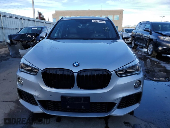 2016 BMW X1 xDrive28i with VIN WBXHT3C34G5E56071, listed as a Copart auction lot 68723182 with 74,488 mi miles. Bid and sale history available at carsss.com. Image 5.