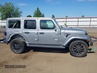 2018 Jeep Wrangler Unlimited Sahara z VIN 1C4HJXEG2JW124882, wystawiony jako IAAI lot #42437816 z przebiegiem Nie podano mil oraz . Historia ofert i sprzedaży dostępna na DreamBid. Obrazek 14.