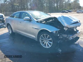 2013 Jaguar XJ with VIN SAJWA1C78D8V45104, listed as a IAAI auction lot 41630568 with 61,671 mi miles and . Bid and sale history available at DreamBid. Image 1.