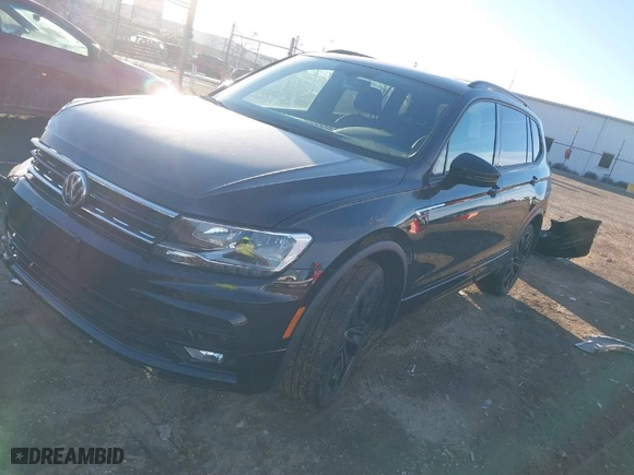2021 Volkswagen Tiguan SE with VIN 3VV2B7AX1MM111328, listed as a IAAI auction lot 41457622 with 30,236 mi miles. Bid and sale history available at carsss.com. Image 2.