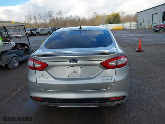 2015 Ford Fusion Titanium Hybrid with VIN 3FA6P0RU8FR181312, listed as a IAAI auction lot 42071584 with 99,955 mi miles. Bid and sale history available at carsss.com. Image 16.