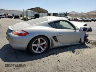 2006 Porsche Cayman S с VIN WP0AB298X6U784563, выставлен на аукционе Copart как лот 69819084 с пробегом 132 131 миль миль и Списание • Salvage title. История ставок и продаж доступна на DreamBid. Изображение 3.