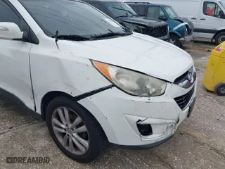 2013 Hyundai Tucson GLS with VIN KM8JU3AC8DU599937, listed as a IAAI auction lot 41398687 with 207,048 mi miles. Bid and sale history available at carsss.com. Image 6.