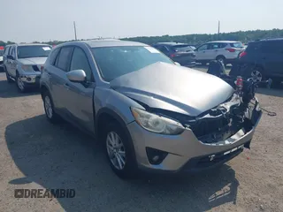 2014 Mazda CX-5 Touring with VIN JM3KE2CY1E0425278, listed as a IAAI auction lot 42465900 with 139,395 mi miles and . Bid and sale history available at DreamBid. Image 1.