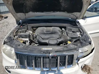 2011 Jeep Grand Cherokee Laredo with VIN 1J4RR4GG8BC724196, listed as a Copart auction lot 51760195 with 79,407 mi miles and Salvage Title. Bid and sale history available at DreamBid. Image 12.