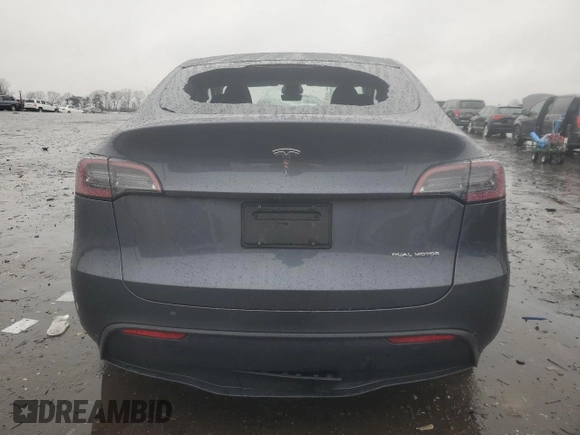 2023 Tesla Model Y Long Range with VIN 7SAYGDEE8PF895293, listed as a Copart auction lot 44208615 with 16,549 mi miles and Salvage Title. Bid and sale history available at DreamBid. Image 6.