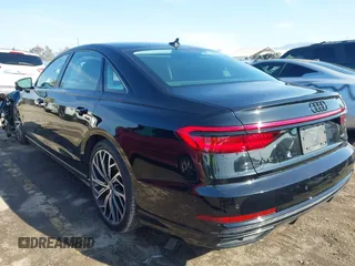 2021 Audi A8 with VIN WAU8EAF80MN023985, listed as a IAAI auction lot 41439011 with 36,127 mi miles. Bid and sale history available at carsss.com. Image 3.