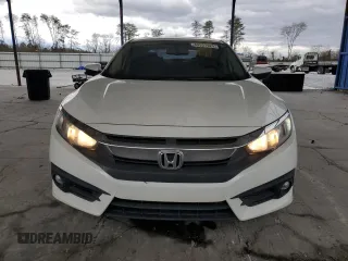 2017 Honda Civic EX-L z VIN 19XFC1F77HE013049, wystawiony jako Copart lot #49931525 z przebiegiem 124 721 mil mil oraz Szkoda całkowita • Salvage title. Historia ofert i sprzedaży dostępna na DreamBid. Obrazek 5.