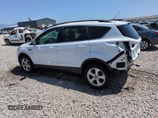 2014 Ford Escape SE with VIN 1FMCU9GX1EUE26459, listed as a Copart auction lot 60756805 with 174,945 mi miles and Salvage title. Bid and sale history available at DreamBid. Image 2.