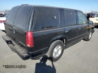 2000 Chevrolet Tahoe Limited with VIN 1GNEC13R7YR221297, listed as a Copart auction lot 75504254 with 246,714 mi miles and Clean Title. Bid and sale history available at carsss.com. Image 3.