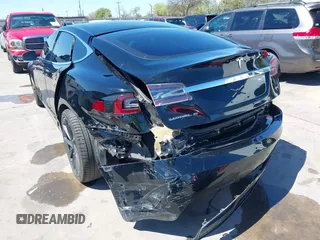 2018 Tesla Model S 75D with VIN 5YJSA1E22JF289195, listed as a IAAI auction lot 41825949 with 49,217 mi miles and . Bid and sale history available at DreamBid. Image 3.