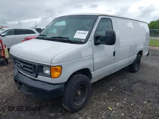 2006 Ford Econoline Cargo with VIN 1FTNS24W46DA75067, listed as a IAAI auction lot 42019008 with 479,196 mi miles. Bid and sale history available at carsss.com. Image 2.