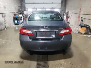 2011 Infiniti M with VIN JN1AY1AR1BM570667, listed as a Copart auction lot 74661744 with 179,340 mi miles and Salvage Title. Bid and sale history available at DreamBid. Image 6.