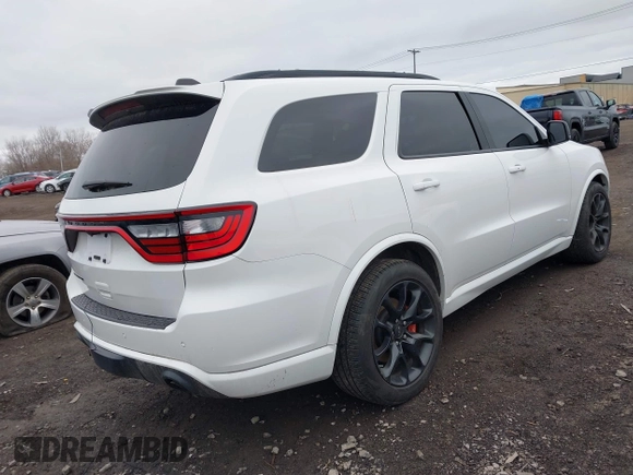 2023 Dodge Durango SRT 392 Premium with VIN 1C4SDJGJ8PC715232, listed as a IAAI auction lot 42051499 with 10,998 mi miles and . Bid and sale history available at DreamBid. Image 4.