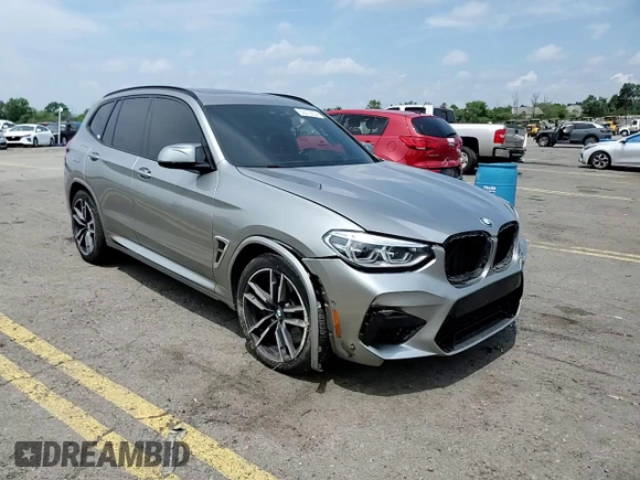 2020 BMW X3 M with VIN 5YMTS0C05LLT10643, listed as a Copart auction lot 62276834 with 39,860 mi miles and Salvage title. Bid and sale history available at DreamBid. Image 11.