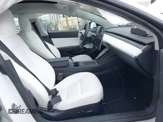 2021 Tesla Model 3 Long Range with VIN 5YJ3E1EB8MF860282, listed as a IAAI auction lot 41787008 with 49,730 mi miles and . Bid and sale history available at DreamBid. Image 5.