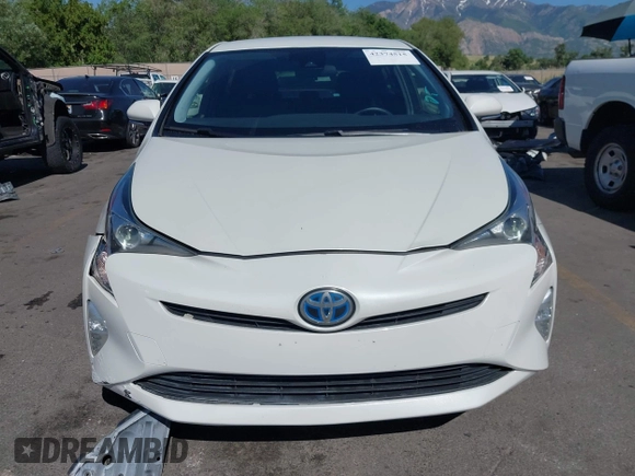 2017 Toyota Prius Two with VIN JTDKARFUXH3536565, listed as a IAAI auction lot 42374515 with 125,240 mi miles and . Bid and sale history available at DreamBid. Image 12.