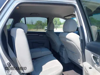 2009 Hyundai Santa Fe SE with VIN 5NMSH73E69H233055, listed as a IAAI auction lot 42454100 with 209,036 mi miles and . Bid and sale history available at DreamBid. Image 8.