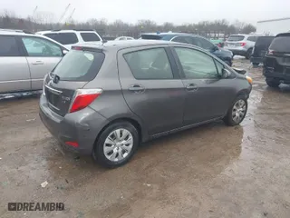2012 Toyota Yaris L with VIN JTDKTUD34CD524342, listed as a IAAI auction lot 41571712 with 135,744 mi miles. Bid and sale history available at carsss.com. Image 4.
