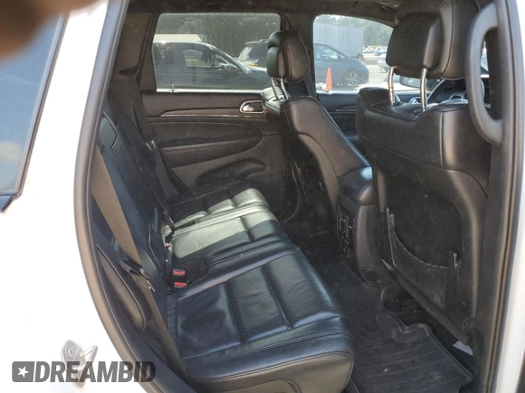 2018 Jeep Grand Cherokee High Altitude with VIN 1C4RJECG1JC260482, listed as a Copart auction lot 57310115 with 144,320 mi miles and Salvage title. Bid and sale history available at DreamBid. Image 11.