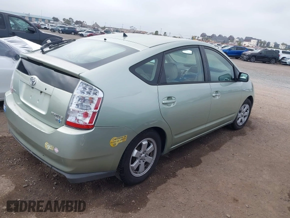 2006 Toyota Prius z VIN JTDKB20U963131145, wystawiony jako IAAI lot #41857847 z przebiegiem 113 251 mil mil oraz . Historia ofert i sprzedaży dostępna na DreamBid. Obrazek 4.