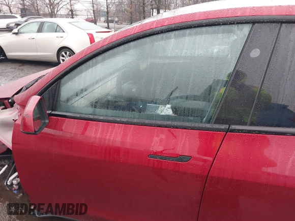 2024 Tesla Model Y Long Range with VIN 7SAYGAEE7RF133073, listed as a IAAI auction lot 41081463 with Not Provided miles and . Bid and sale history available at DreamBid. Image 16.