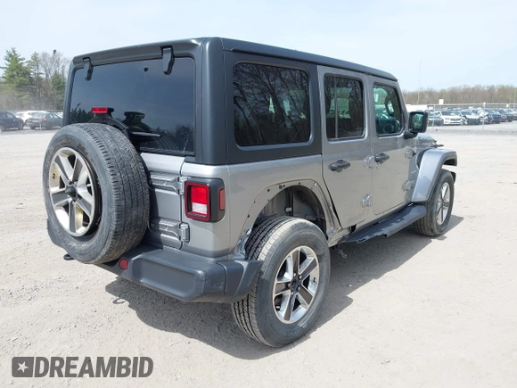 2018 Jeep Wrangler Unlimited Sahara with VIN 1C4HJXEG4JW141540, listed as a IAAI auction lot 42148402 with 43,909 mi miles and . Bid and sale history available at DreamBid. Image 4.