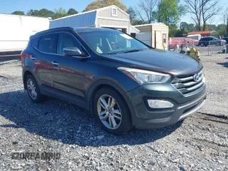 2013 Hyundai Santa Fe Sport z VIN 5XYZUDLA6DG019790, wystawiony jako IAAI lot #41980044 z przebiegiem 282 456 mil mil oraz . Historia ofert i sprzedaży dostępna na DreamBid. Obrazek 1.