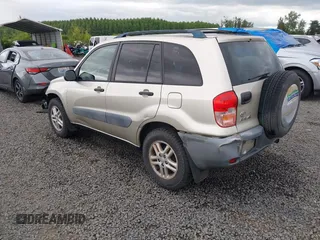 2001 Toyota RAV4 with VIN JTEGH20V810013042, listed as a IAAI auction lot 42321163 with 152,535 mi miles and . Bid and sale history available at DreamBid. Image 3.