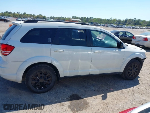 2017 Dodge Journey SE with VIN 3C4PDCAB5HT569154, listed as a IAAI auction lot 41891552 with 126,861 mi miles and . Bid and sale history available at DreamBid. Image 13.