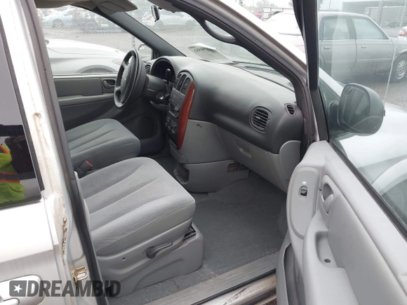 2005 Chrysler Town & Country LX with VIN 2C4GP44R35R152152, listed as a IAAI auction lot 42190551 with 128,239 mi miles and . Bid and sale history available at DreamBid. Image 5.