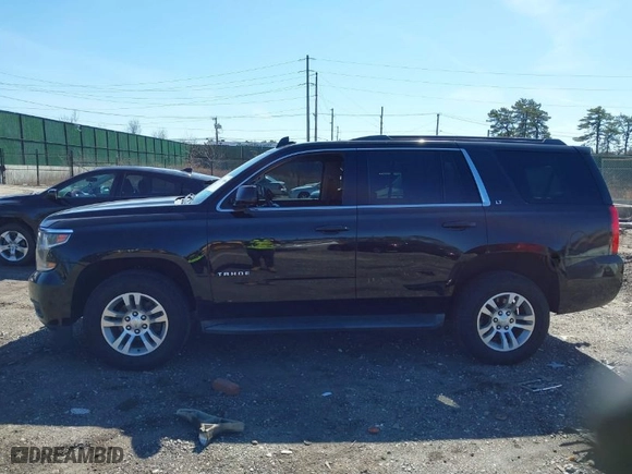 2016 Chevrolet Tahoe LT with VIN 1GNSKBKC5GR177596, listed as a IAAI auction lot 41768564 with 155,126 mi miles. Bid and sale history available at carsss.com. Image 14.
