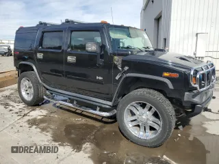 2006 Hummer H2 with VIN 5GRGN23U36H101486, listed as a Copart auction lot 74577884 with 146,203 mi miles and Salvage Title. Bid and sale history available at carsss.com. Image 4.