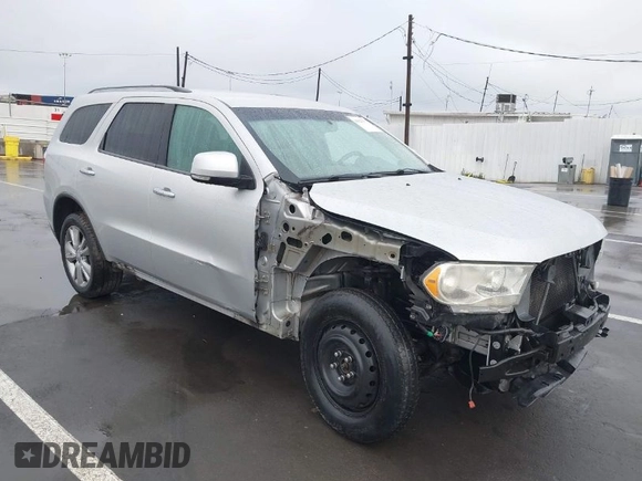 2013 Dodge Durango Crew z VIN 1C4RDJDGXDC637572, wystawiony jako IAAI lot #41922757 z przebiegiem 110 941 mil mil oraz . Historia ofert i sprzedaży dostępna na DreamBid. Obrazek 1.