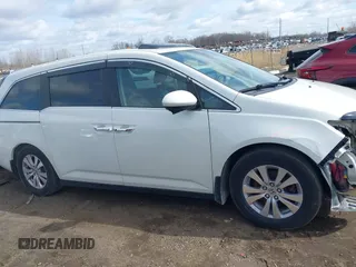 2014 Honda Odyssey EX-L with VIN 5FNRL5H63EB136541, listed as a IAAI auction lot 41866320 with 148,696 mi miles and . Bid and sale history available at DreamBid. Image 14.