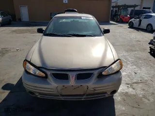2001 Pontiac Grand Am SE with VIN 1G2NE52T91M583582, listed as a Copart auction lot 77808974 with 126,219 mi miles and Salvage Title. Bid and sale history available at carsss.com. Image 5.