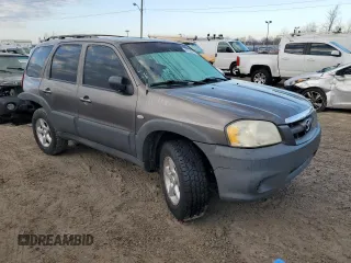 2006 Mazda Tribute i with VIN 4F2YZ02Z46KM34309, listed as a Copart auction lot 46506105 with 237,475 mi miles and Salvage Title. Bid and sale history available at carsss.com. Image 4.