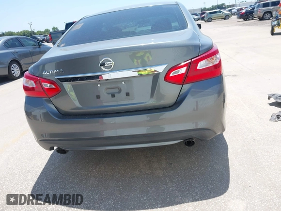 2016 Nissan Altima S z VIN 1N4AL3AP6GC228463, wystawiony jako IAAI lot #42032010 z przebiegiem 159 999 mil mil oraz . Historia ofert i sprzedaży dostępna na DreamBid. Obrazek 17.