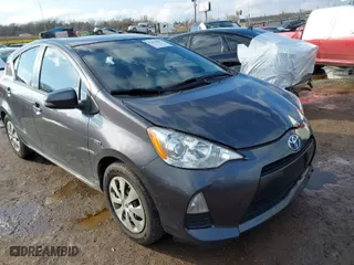 2014 Toyota Prius c One with VIN JTDKDTB38E1075360, listed as a IAAI auction lot 41418483 with 203,708 mi miles. Bid and sale history available at carsss.com. Image 1.