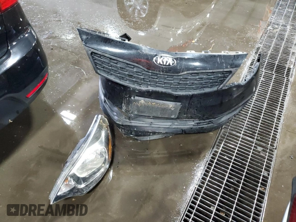 2013 Kia Rio LX z VIN KNADM4A38D6283981, wystawiony jako Copart lot #60595875 z przebiegiem 144 817 mil mil oraz Nie do naprawy • Non repairable. Historia ofert i sprzedaży dostępna na DreamBid. Obrazek 12.