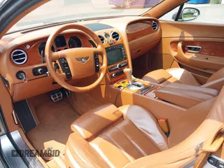 2005 Bentley Continental GT GT z VIN SCBCR63W45C024347, wystawiony jako IAAI lot #42425201 z przebiegiem 97 414 mil mil oraz . Historia ofert i sprzedaży dostępna na DreamBid. Obrazek 19.
