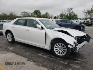 2014 Chrysler 300 z VIN 2C3CCAAG7EH148451, wystawiony jako Copart lot #54672815 z przebiegiem 154 241 mil mil oraz Szkoda całkowita • Salvage title. Historia ofert i sprzedaży dostępna na DreamBid. Obrazek 4.