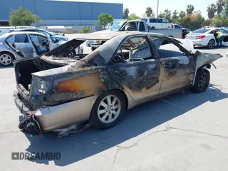 2003 Toyota Camry LE z VIN 4T1BF30K33U551509, wystawiony jako IAAI lot #42159776 z przebiegiem Nie podano mil oraz . Historia ofert i sprzedaży dostępna na DreamBid. Obrazek 4.