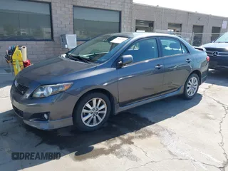 2009 Toyota Corolla with VIN 1NXBU40E19Z143959, listed as a IAAI auction lot 42032312 with 155,776 mi miles. Bid and sale history available at carsss.com. Image 2.